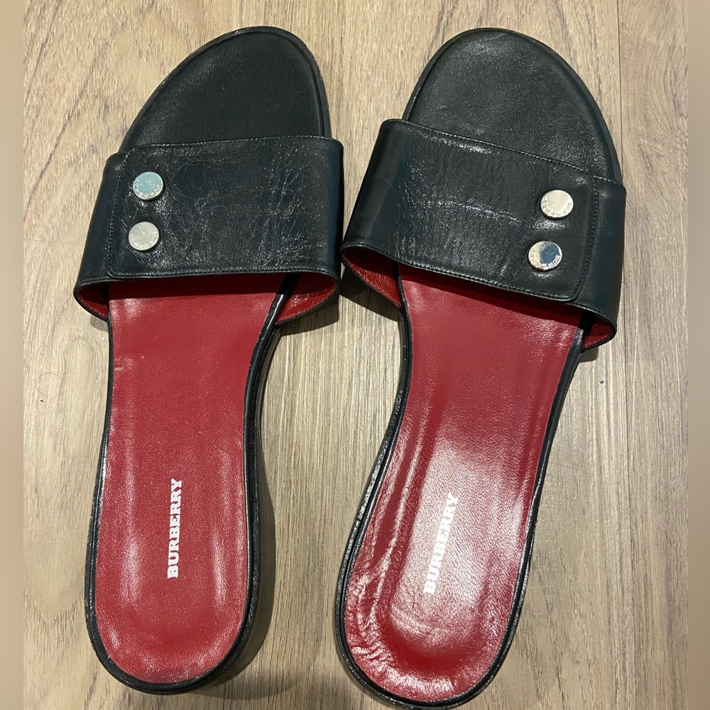 Black Burberry sandal with 2 silver designed “buttons”